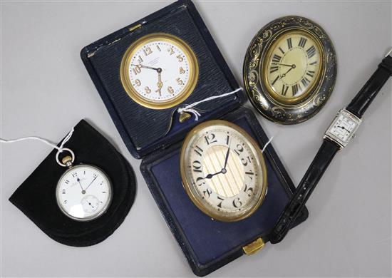 A Swiss gilt metal travel alarm clock in folding leather case and four other items,